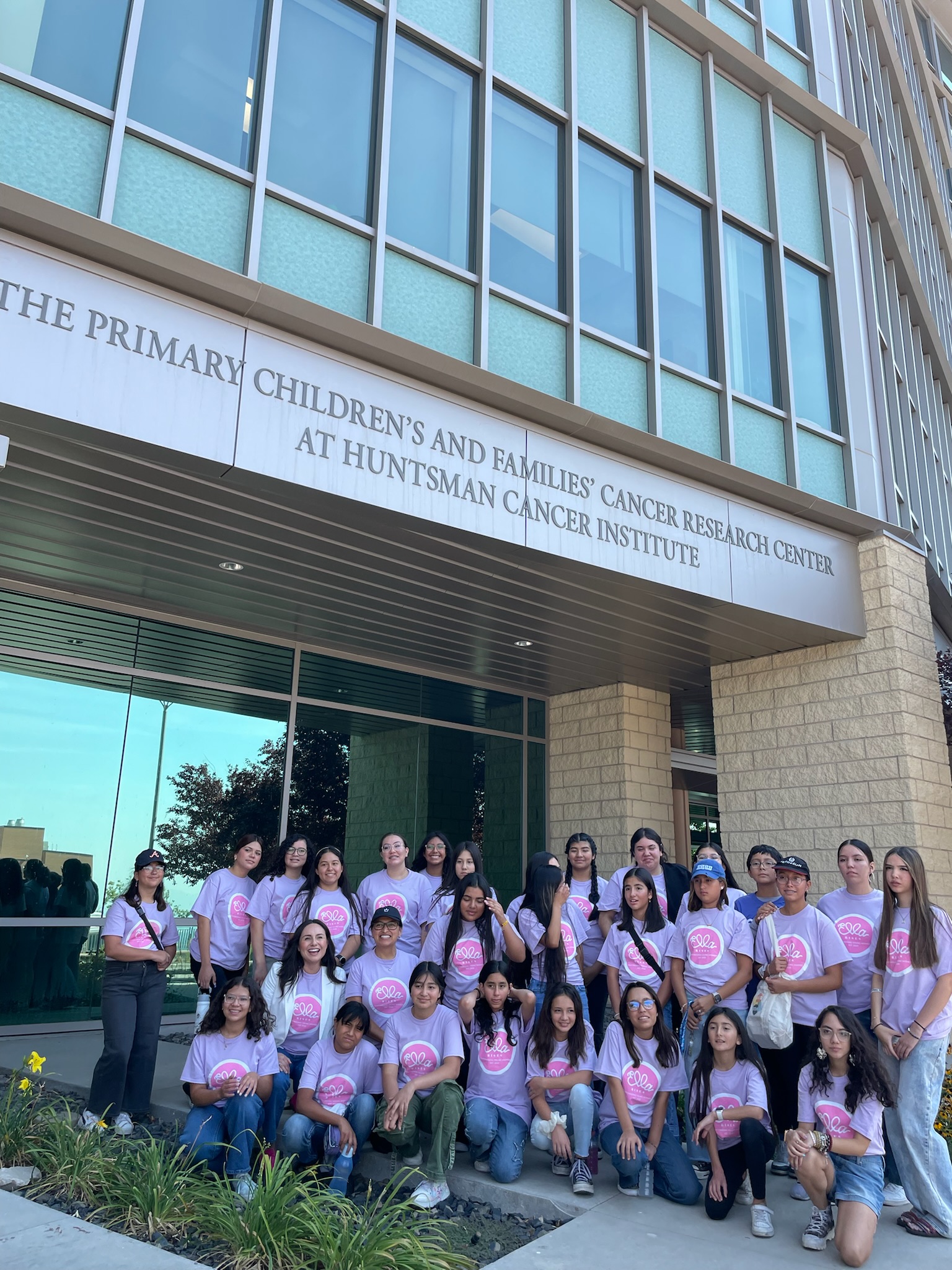 Ella Rises students posing together outside the Huntsman Cancer Institute